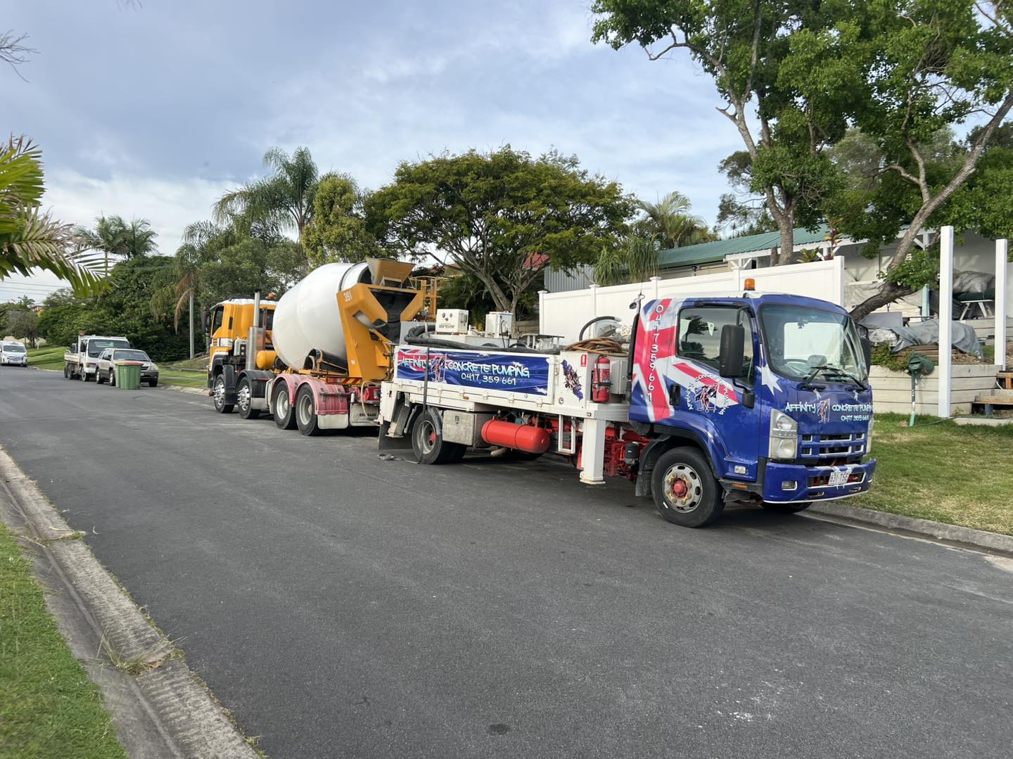 Concrete agitator and pump truck ready for pour
